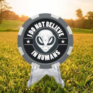 I do not believe in humans alien head gray and white poker chip style golf ball marker.